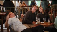 Patrons entering tips at the bar Patrons entering tips at the bar